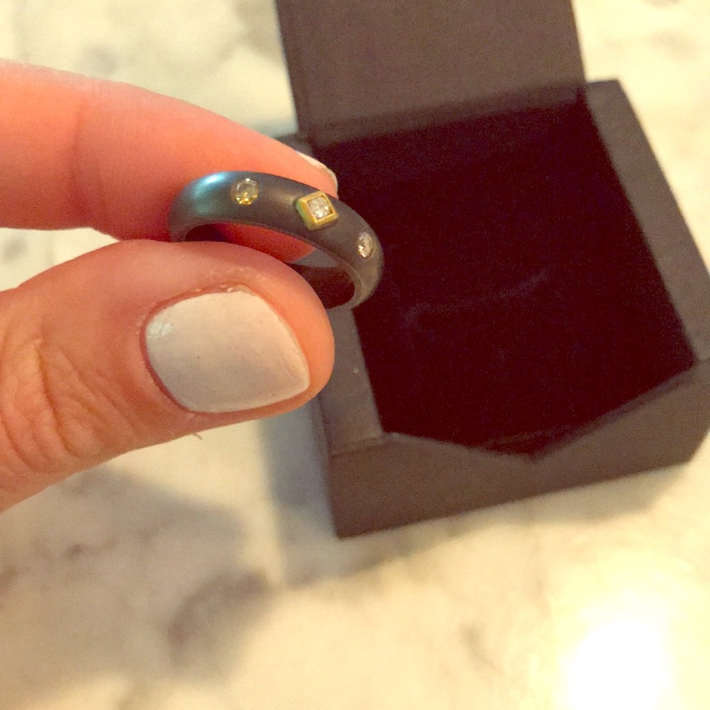 Black ring size 5.5 with 3 small diamonds. Custom